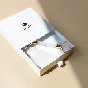 Massajador facial em quartzo.webp